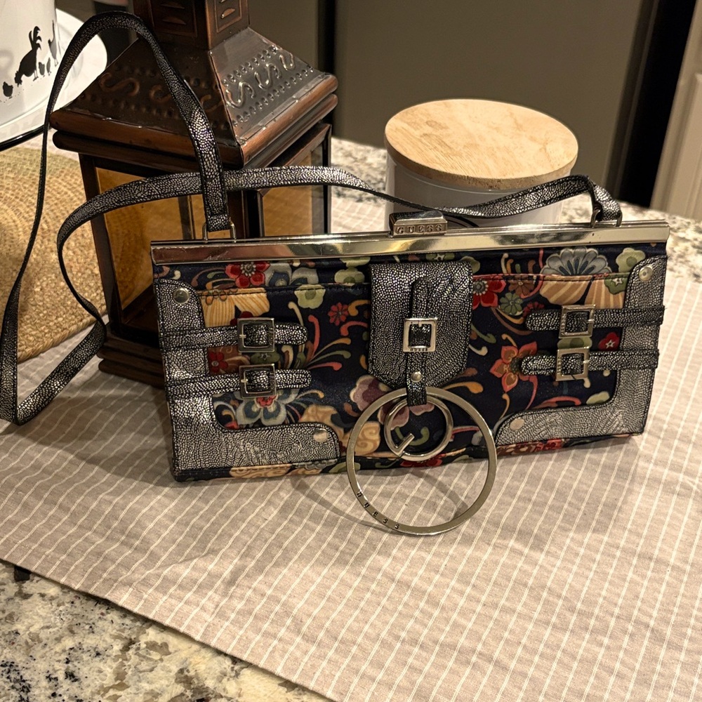 Floral Guess Clutch purse with Silver Accents